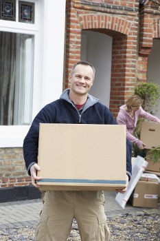 Professional house removalists assisting with packing at Ealingself Storage
