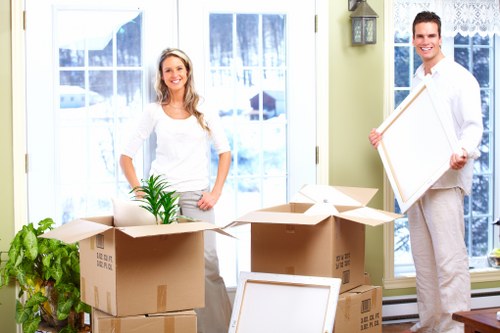 Removalist team handling furniture for a move
